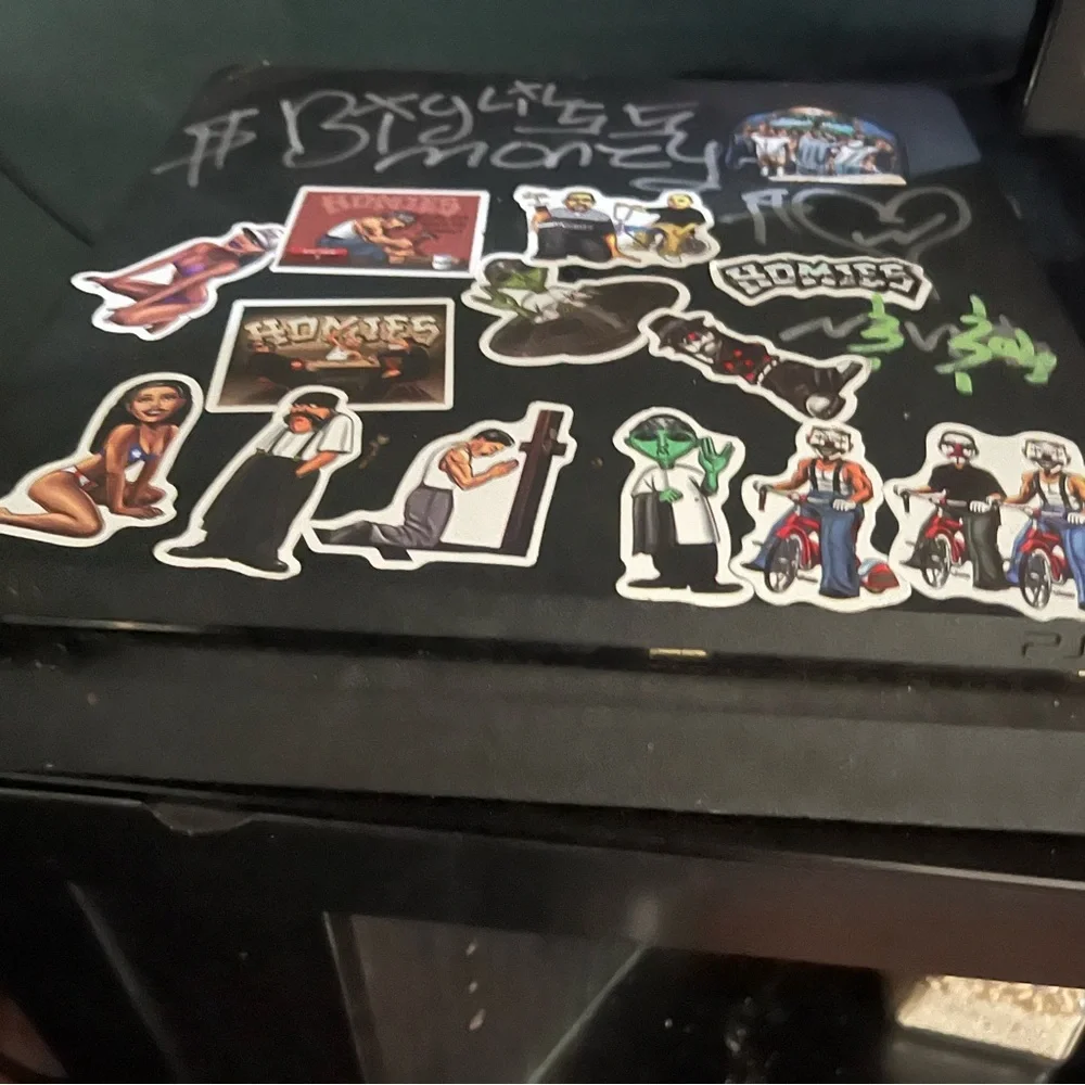 Black Gaming Console/Device with Sticker Decor
